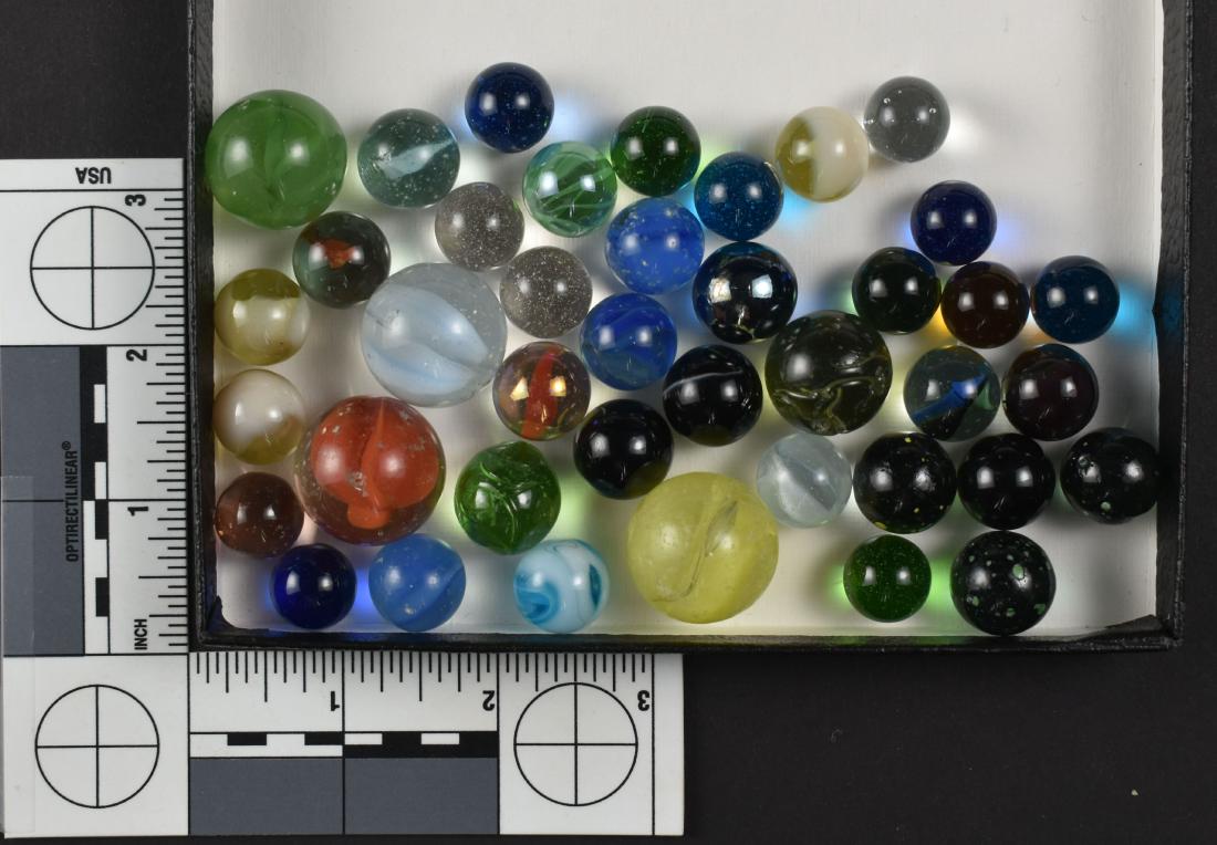 Vintage lot of Glass Marbles: Variety of types present, several with manufacturing flaws.