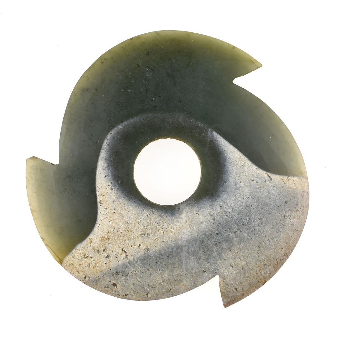 Gorgeous Chinese Shang Style Jade Notched Disc: This is a fairly recent example of an ancient masterwork. The Jade is highly translucent and very high quality with quite striking eye appeal. Fine silky smooth polish over its entirety. From Shaanxi 