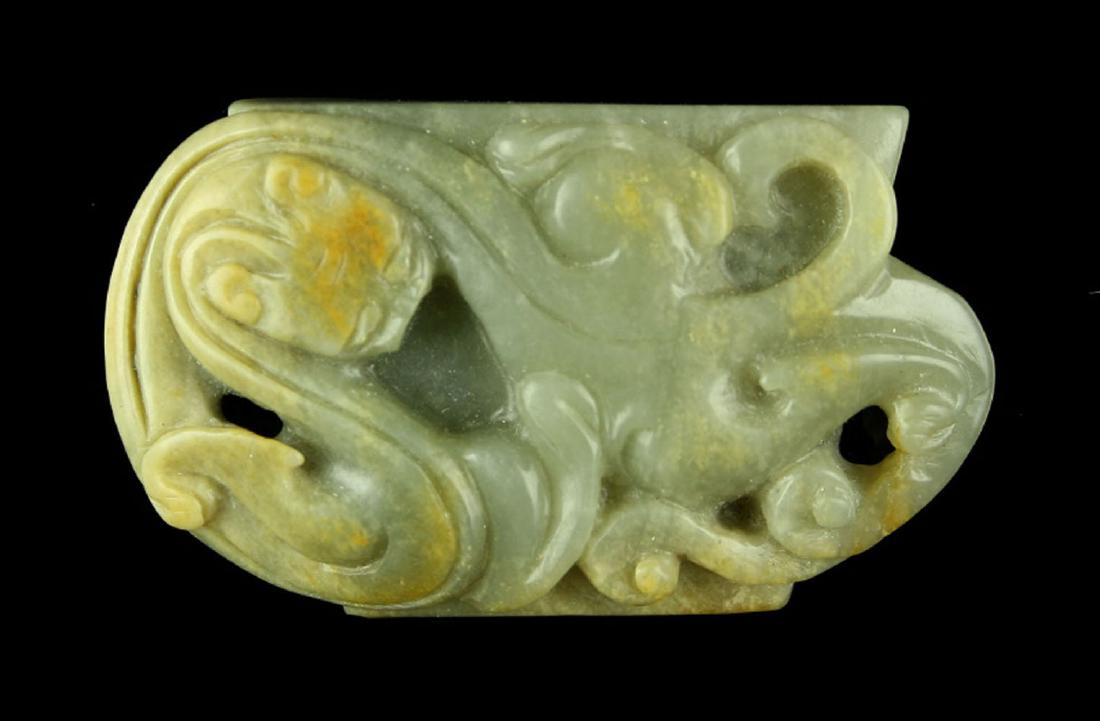 ANCIENT CHINESE JADE DRAGON SWORD CHAPE HAN DYNASTY: High quality Jade green and russet sword chape. This piece would have been at the bottom end of a sword scabbard. The scabbard would have been made of wood and decorated with either lacquers, paints, 