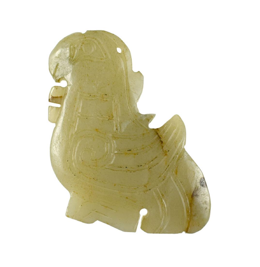 CHINESE SHANG DYNASTY STYLE BIRD PENDANT: Extra Fine Shang Dynasty Style Bird Pendant. Magnificent crested bird image in profile carved from a substantial slab of Jade. The surface carving covers both sides and reflects detailed eyes, wings, 