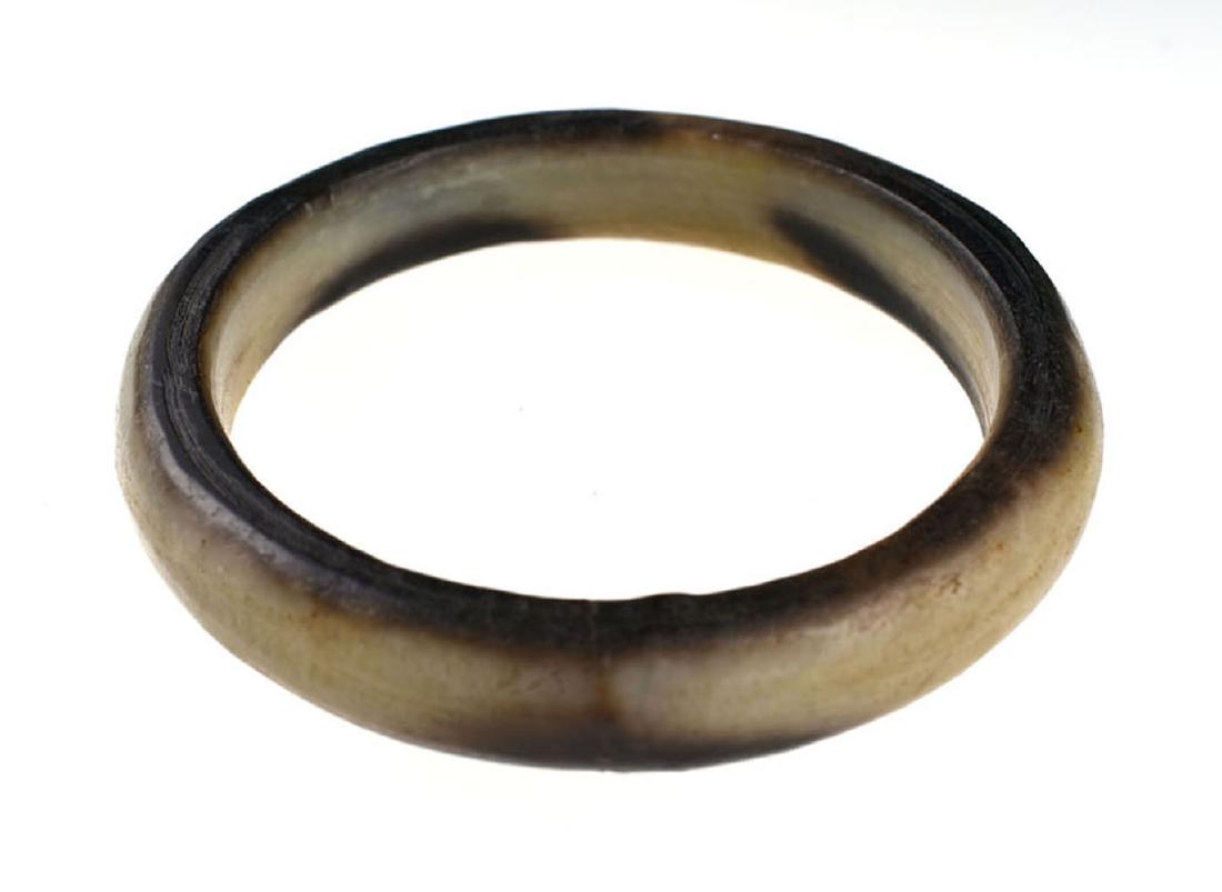 FINE CHINESE MING DYNASTY NEPHRITE JADE BANGLE: Fine Chinese Ming Dynasty Nephrite Jade Bangle. Truly a gorgeous example of Ming Dynasty artistry. Made of high quality, nicely translucent brown and white Nephrite Jade with great 'eye appeal'. Well 