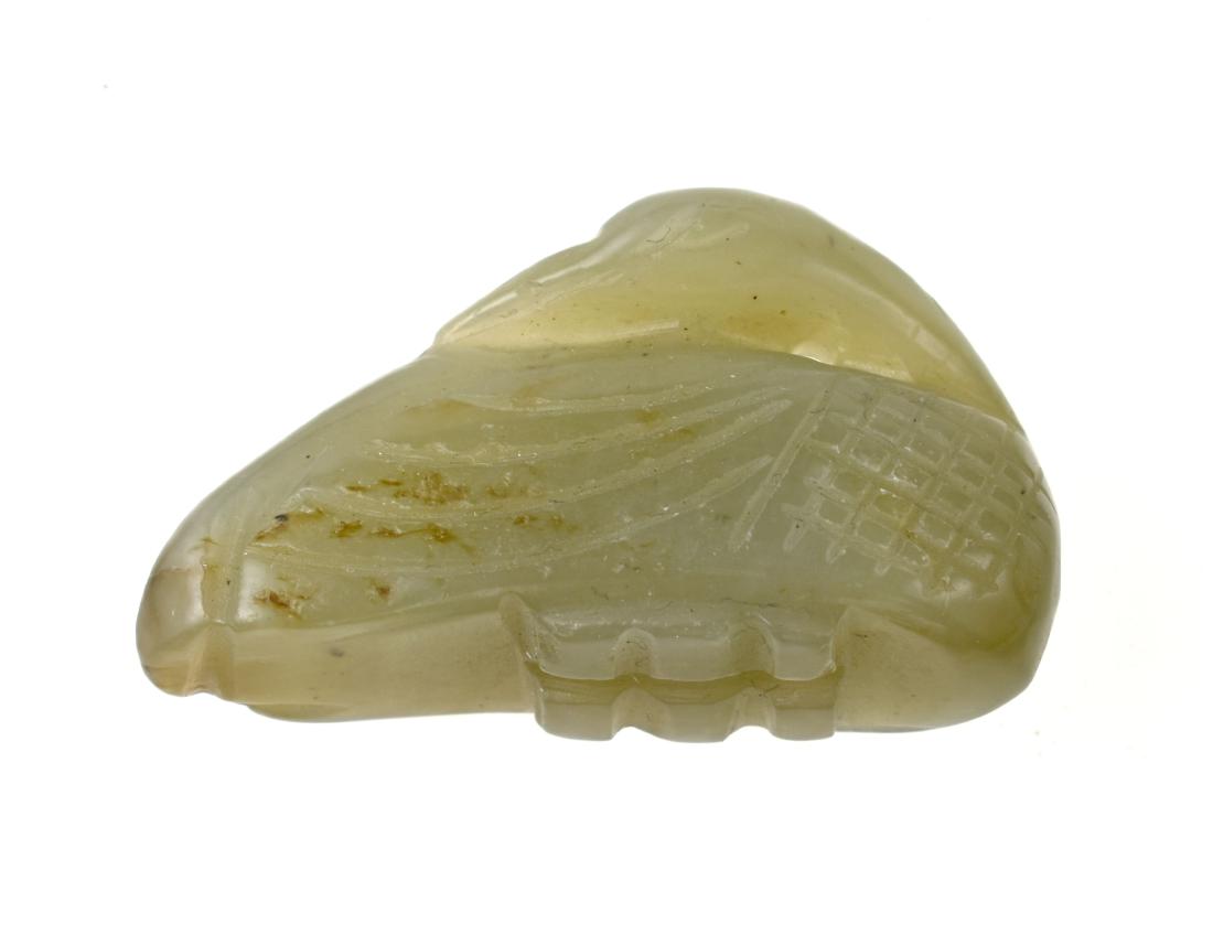 Ancient Chinese Jade Swan Pendant: This is a beautiful antique light green Chinese Jade Swan Pendant in the Han Dynasty (206 B.C. - 220 A.D.) style. Well carved and Highly Translucent! Measures 1 1/2" long 1/2" wide x &