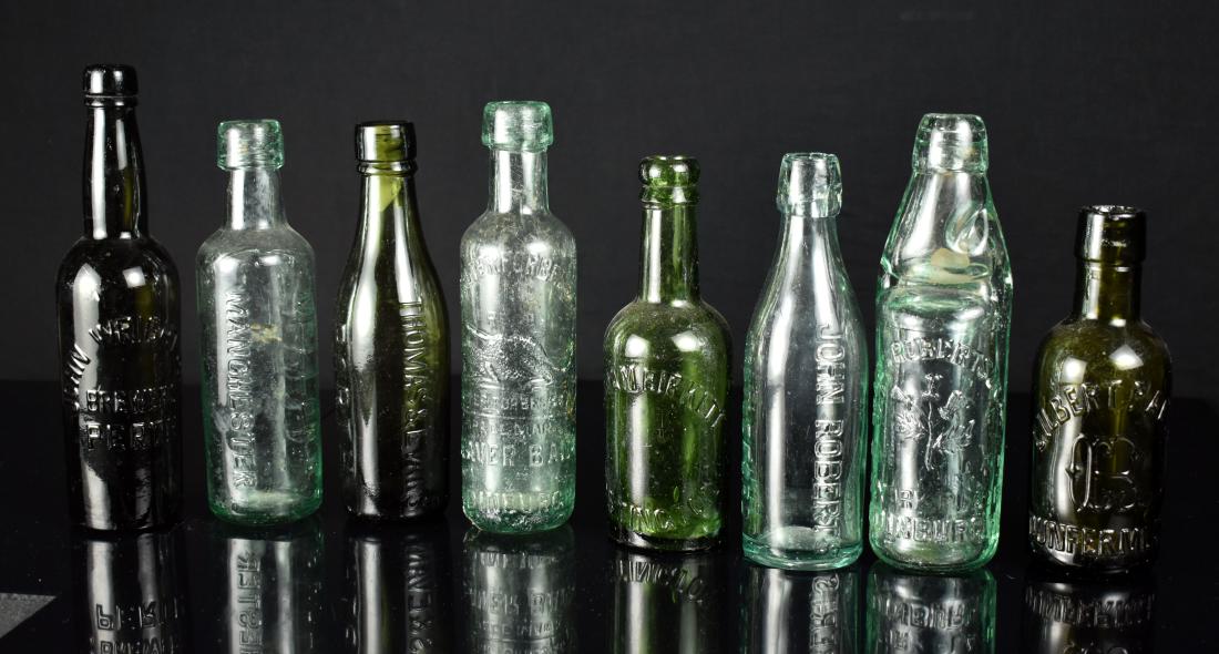 8 1800's British Beer/Liquour bottles: Unusual types with screw lids and one 'cod-mouth' bottle with marble. Unique collection!