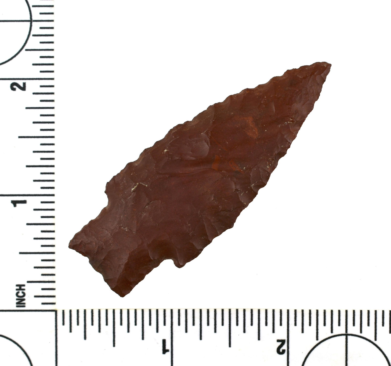 2-3/4" Western Scottsbluff: Exceptional example in Brick-Red jasper from the Robert Beckett Ranch Collection of Lassen Co., California. Rare.