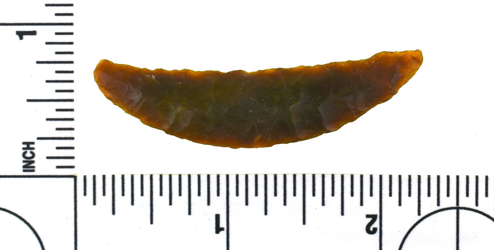 2-3/16" Paleo Crescent: Translucent brown agate example from the Robert Beckett Ranch Collection from Lassen Co., California. Excellent opportunity to get a rare Paleo Crescent!