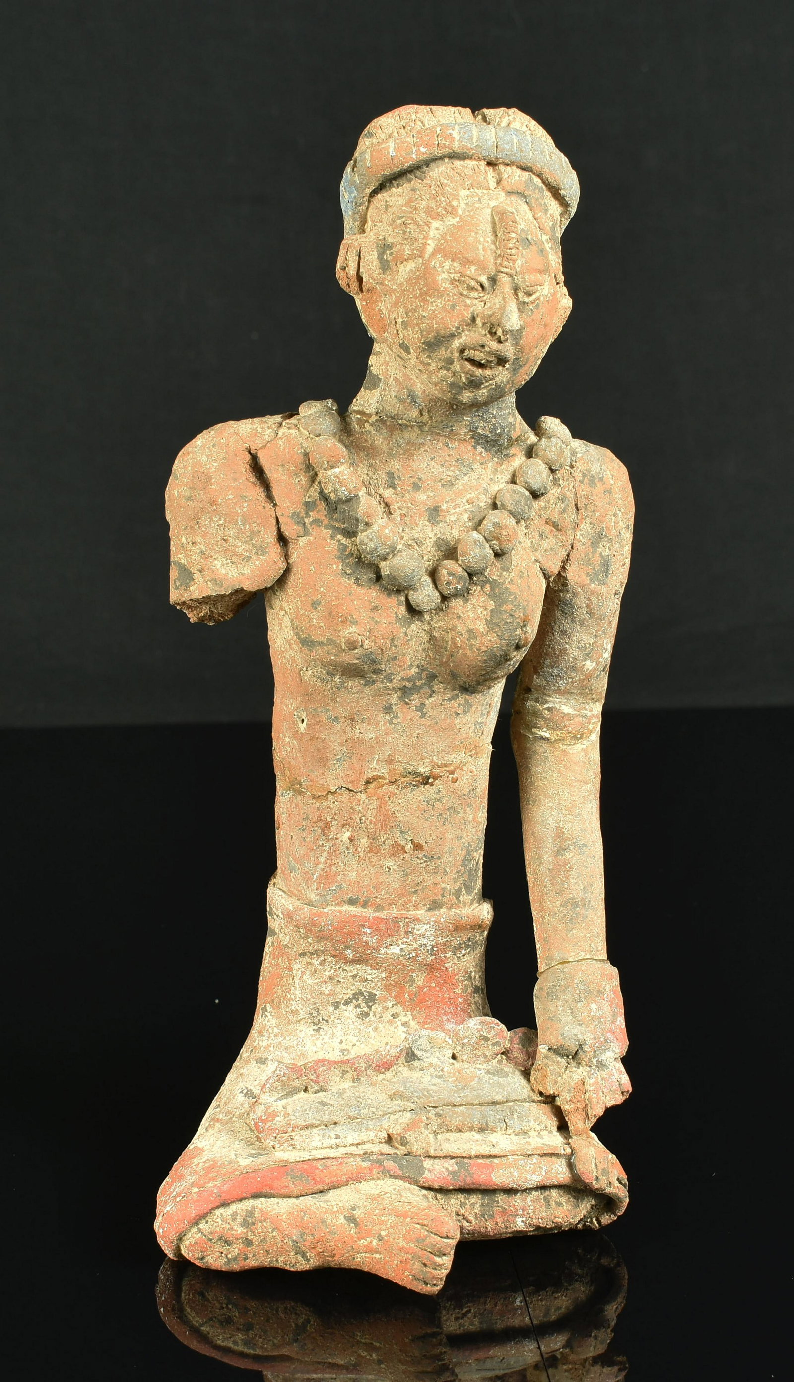 8" Mayan Jaina Figural *repaired: Nicely made partially complete Jaina figural with red and blue paint remnant. Repaired from multiple fragments to about 80%+ complete. Very detailed features on this female representation.