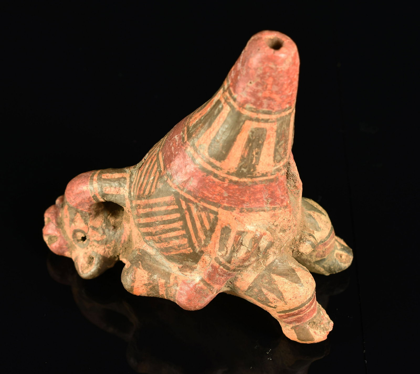 3.5" Nicoya Phallic Ocarina: Costa Rican Nicoya culture Ocarina featuring a reclining male animal/anthropomorphic figure with anatomical correct features..holding exaggerated phallus for whistle. No, we didn't test functionality.