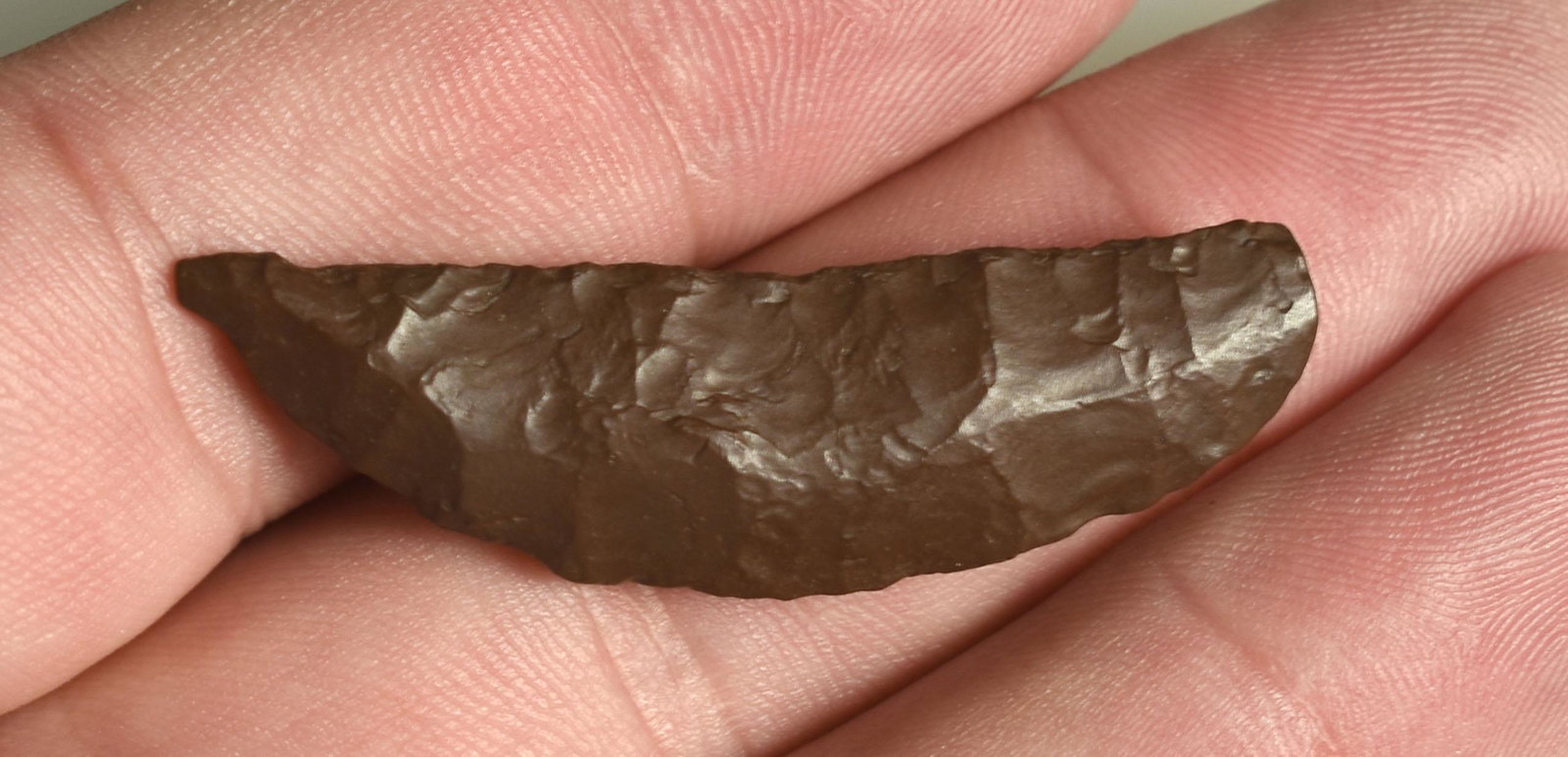 1-13/16" Paleo Crescent: Brown jasper with wind wear. Lassen Co., California. Ex Robert Beckett Collection.