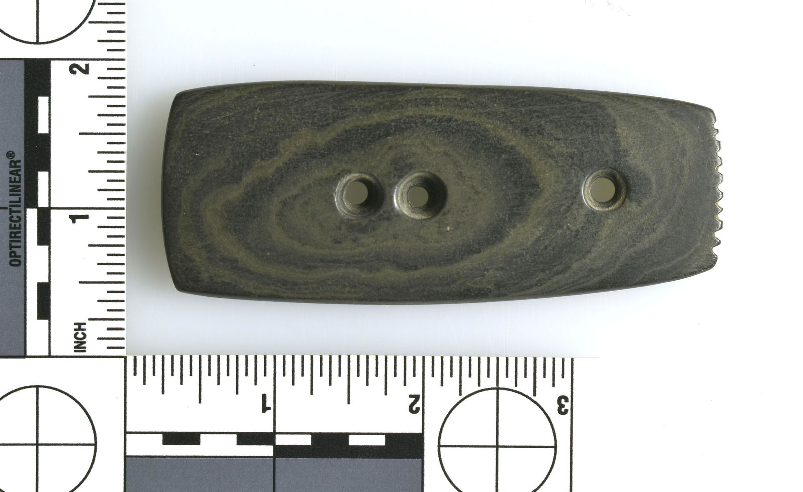 3-3/4" Fringed Gorget: Triple drilled gorget with tallied fringe. Collector polish present. Ohio.