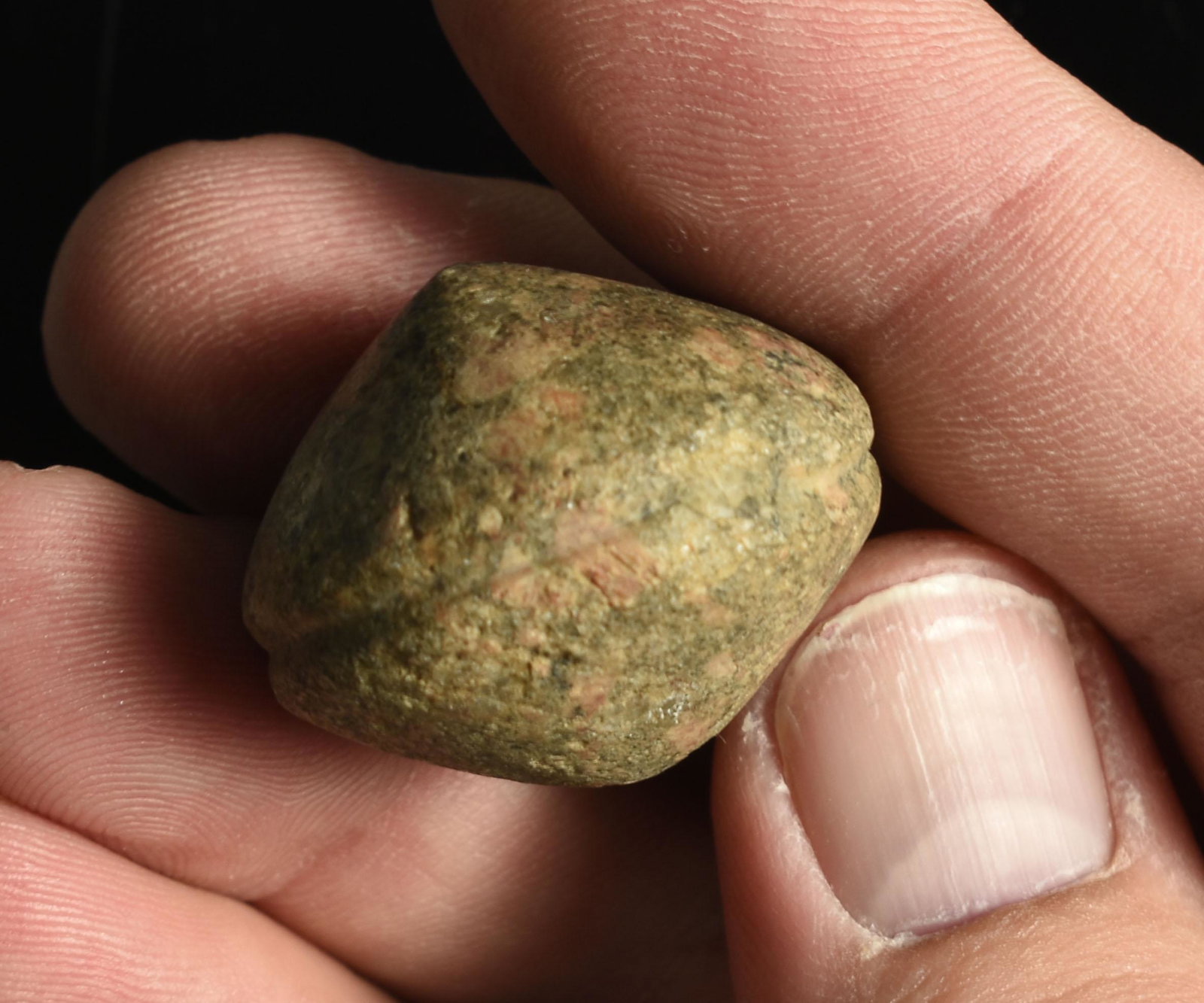 1-1/4" Grooved Plummet?: Unusual bi-conical artifact with grooved perimeter. Porphyry.