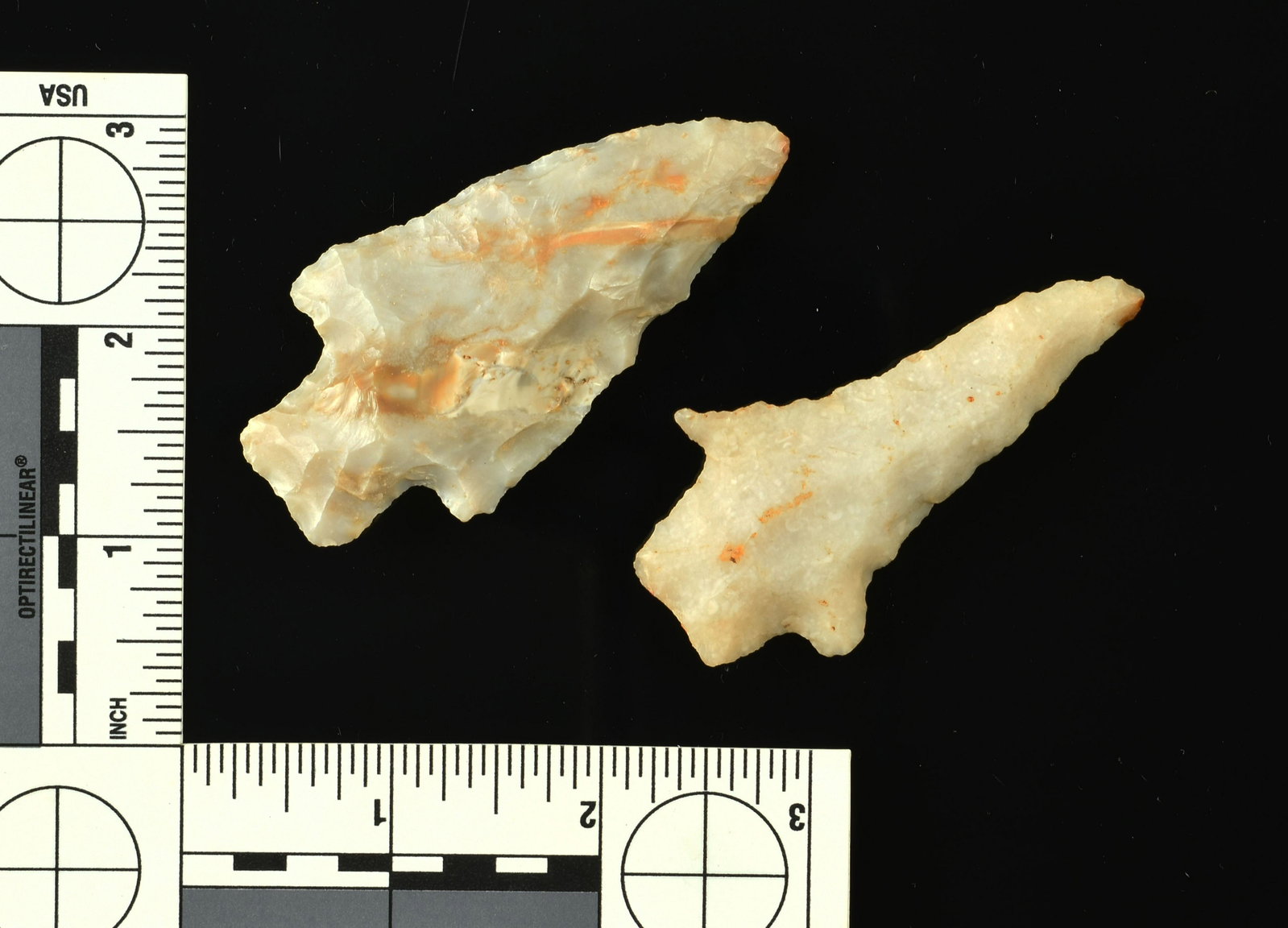 Pair of Fine Translucent Tennessee Arrowheads: The longest measures 3 inches and is made of a highly translucent cream, tan, and brown glossy flint. The other one is translucent quartz. Both are great points with nice size in excellent condition. 