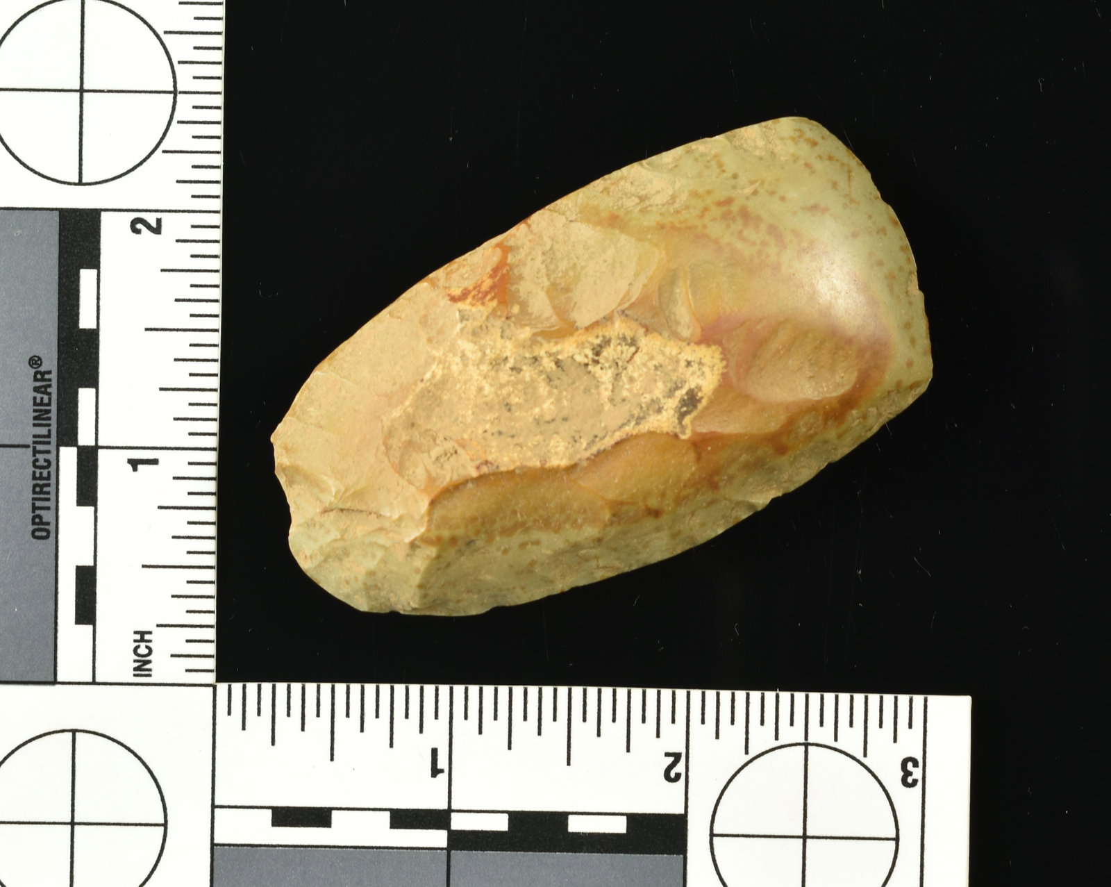 Highly Polished St. Louis Green Flint Celt: Found in Bath Co., Kentucky. Ex- 'Pop' Williams Collection. Polished over its entirety. Pretty light green with red mottling running throughout. Measures 2 15/16".