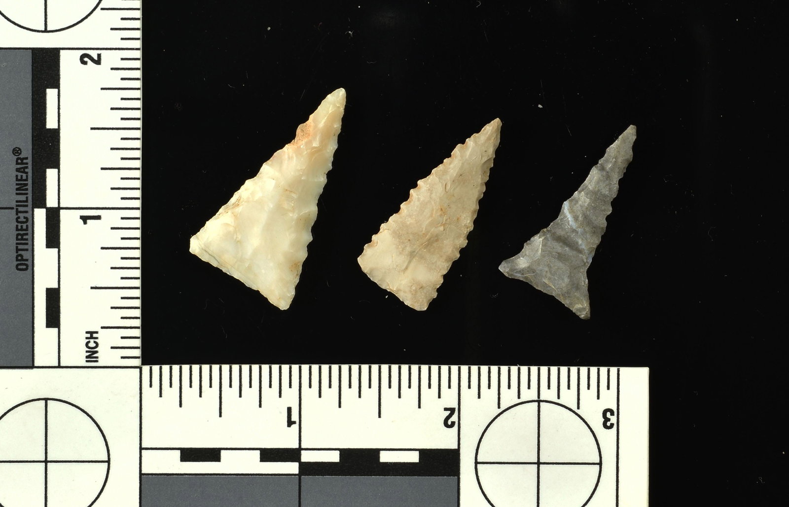 3 World Class Triangles: Largest is a super fine highly translucent 1 5/16" glossy White Flint Ridge example from Ohio. The other two are serrated Fort Ancient examples from Kentucky. All extremely fine.