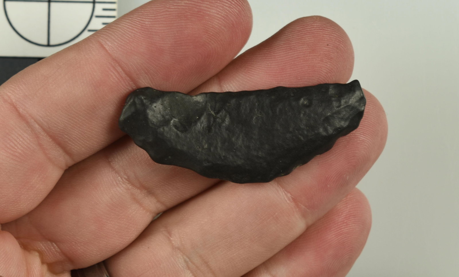 2" Paleo Crescent: Nice well weathered partially uniface example found in Lassen Co., California. Ex Robert Beckett Estate Collection.