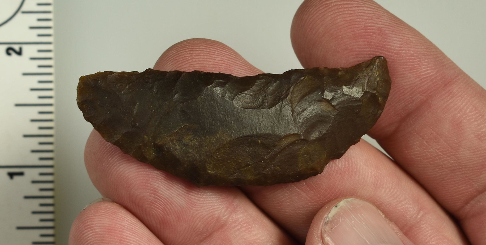 2-5/16" Butterfly Paleo Crescent: Brown jasper example with noticeable hafting area. Ex Beckett Collection. Lassen Co., California.