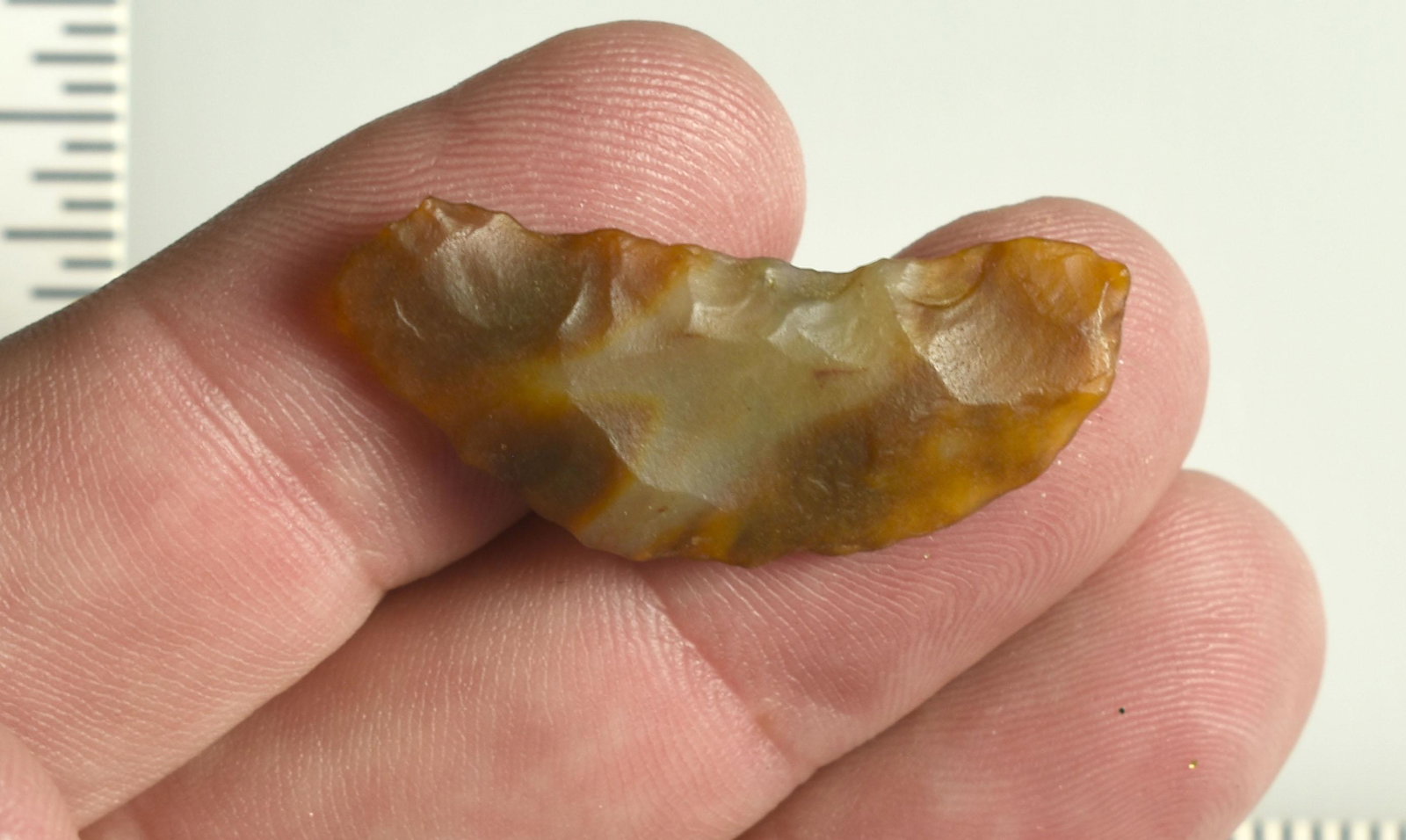 1-1/2" Paleo Crescent: Translucent multicolor agate. Lassen Co., California. Ex Robert Beckett Collection.