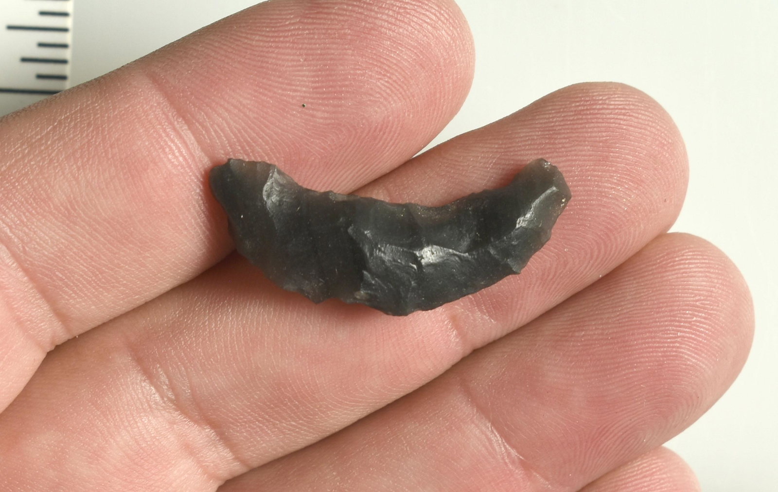 1-5/16" Paleo Crescent: Obsidian. Lassen Co., California. Ex Robert Beckett Collection.