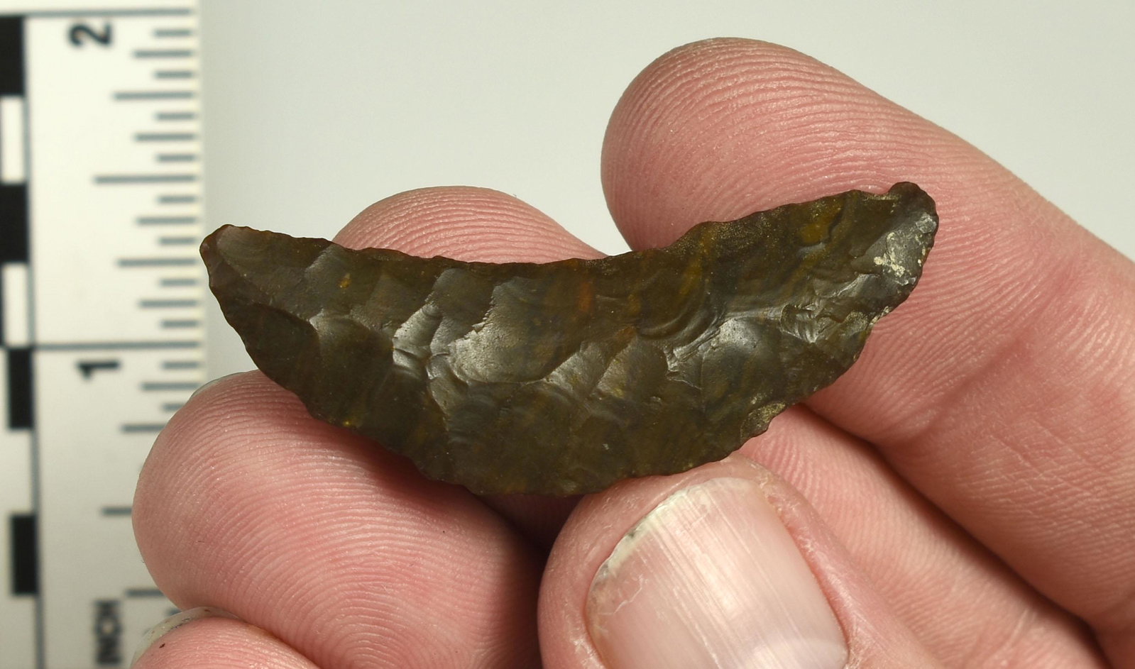 1-15/16" Paleo Crescent: Exceptional banded chocolate jasper. Well flaked both sides. Ex Beckett Collection. Lassen Co., California.