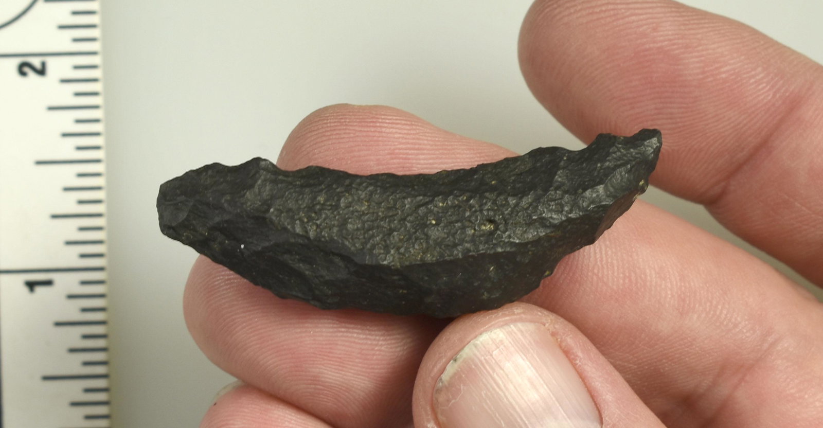 2-1/8" Paleo Crescent: Serrated example in basalt/dacite. Ex Beckett Collection. Lassen Co., California.