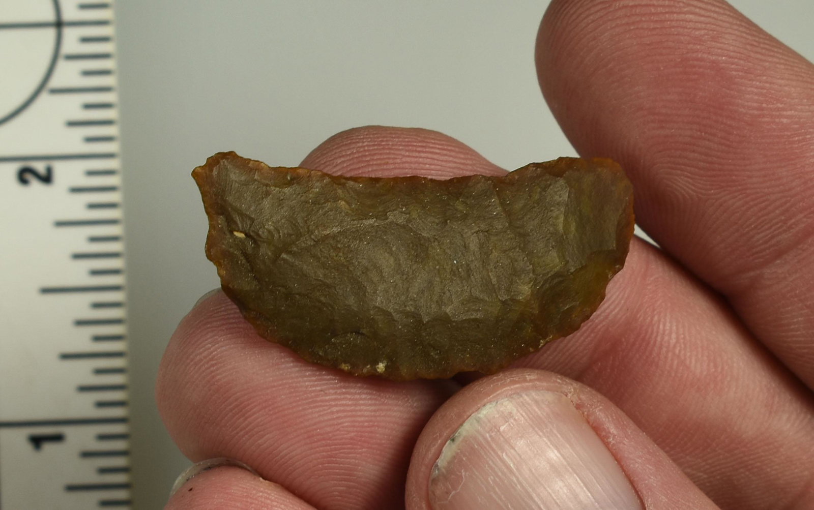 1-9/16" Paleo Crescent: Nice lightly translucent, partially uniface example. Ex Beckett Collection. Lassen Co., California.