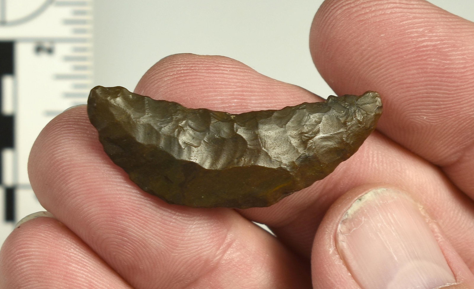 1-5/8" Paleo Crescent: Brown Jasper example with nice flaking both sides. Ex Beckett Collection. Lassen Co., California.