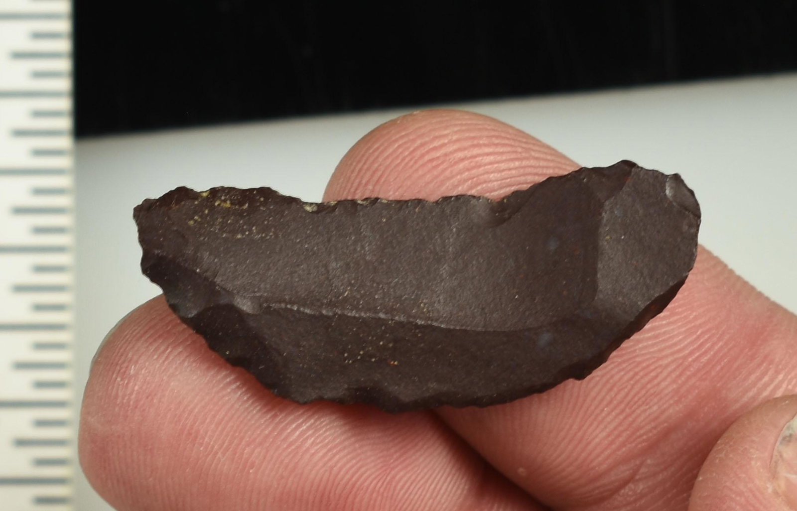 1-9/16" Paleo Crescent: Made on a flake example. Purple Jasper. Ex Beckett Collection. Lassen Co., California.