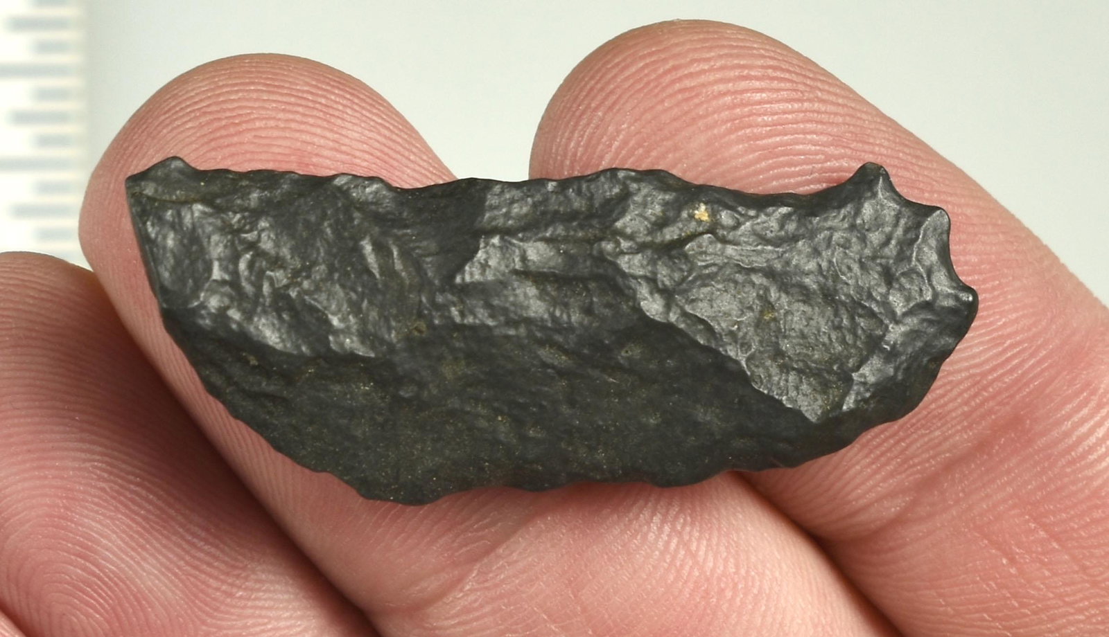 1-13/16" Paleo Crescent: Basalt. Serrations on one end. Ex Beckett Collection. Lassen Co., California.