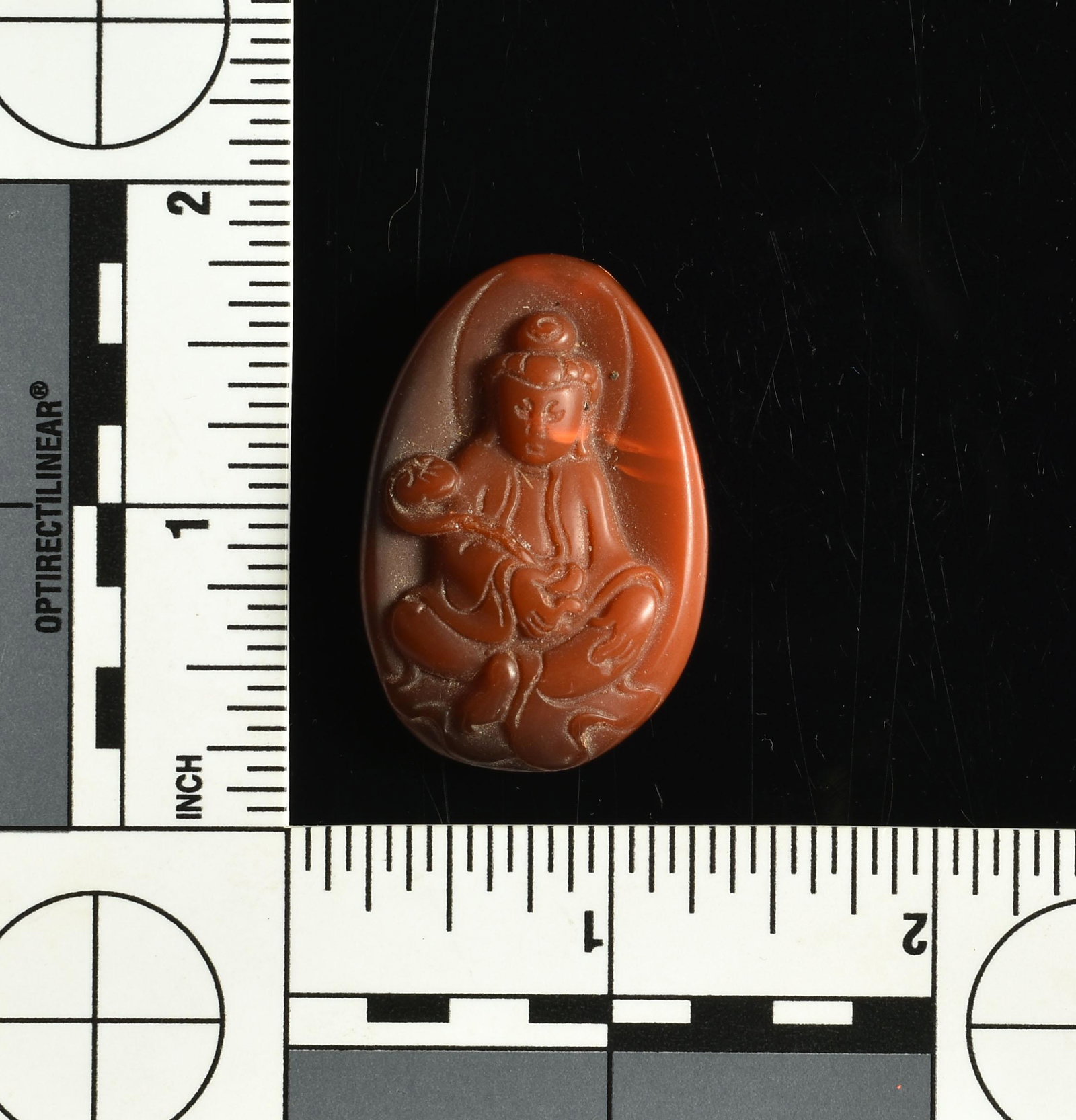 1-5/8" Buddhist Pendant: Red translucent material. Nice!