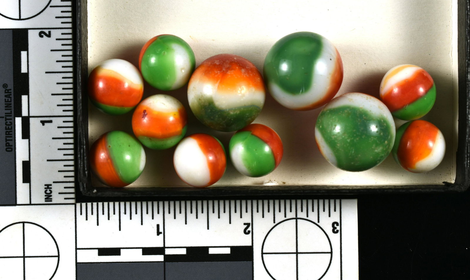 11 Vintage Marble King Marbles: Nice lot of 'Rainbow Red' marbles with green secondary patch color.
