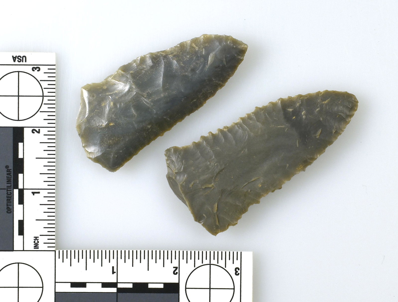 2 Extra Large Snapped Base Hornstone Kirks: Large, ultra thin, and finely serrated. Both from Logan Co., Kentucky. Largest is 3 1/4". Slightly shorter one actually appears to have been made that way in the base. Possibly pre-historically s