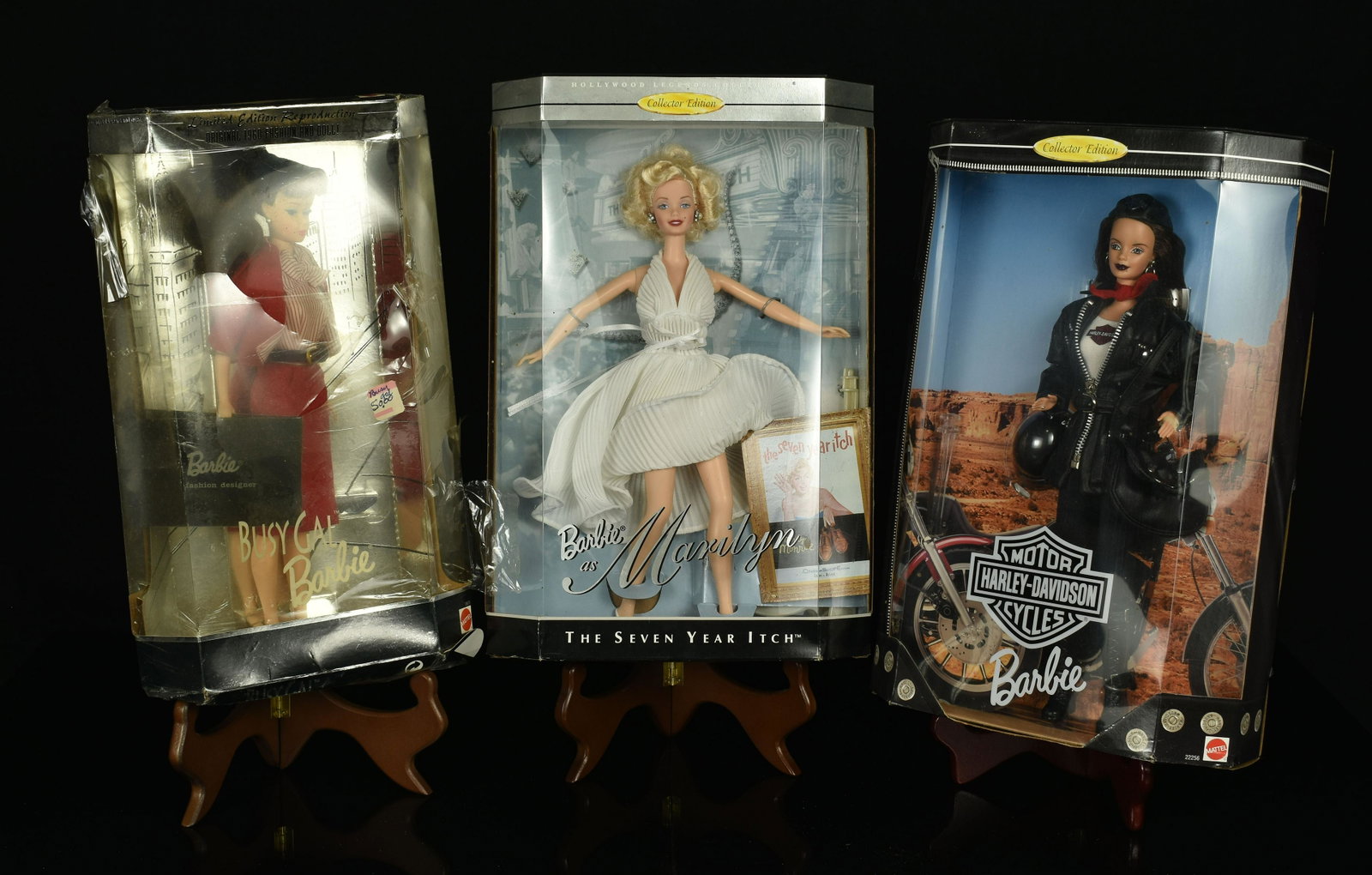 3 Vintage Barbie Dolls: 1995 Limited Edition Reproduction Busy Gal Barbie - some box damage., 1998 Harley Davidson Motorcycle Barbie. 1997 Marilyn Monroe - The Seven Year Itch Barbie. New in box condition. Other two boxes ar