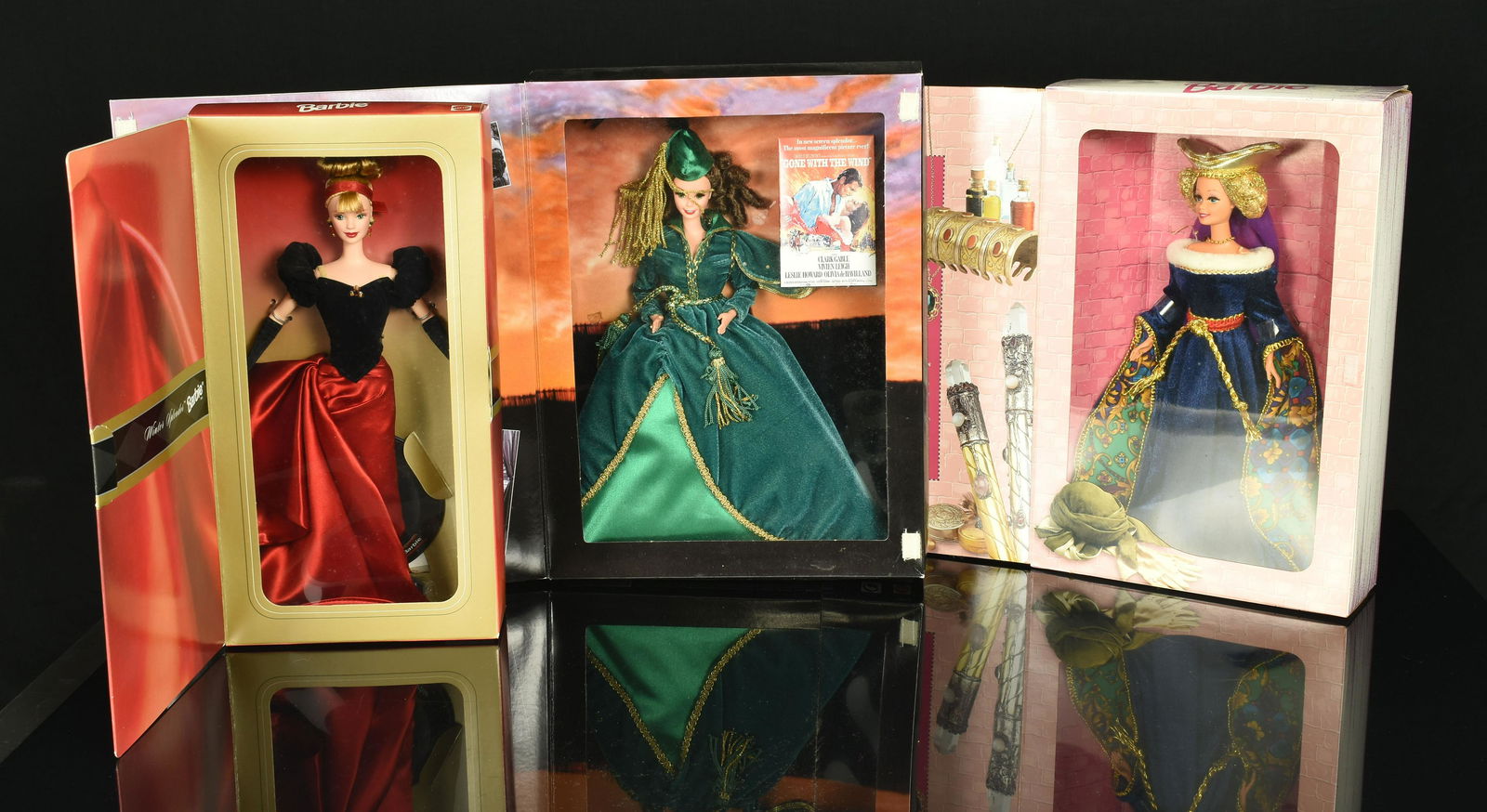 3 NIB Vintage Barbie Dolls: Avon Winter Splendor Barbie (1998), Great Eras Collections Medieval Lady Barbie (1994), Hollywood Legends - Gone with the Wind Scarlett O'Hara Barbie (1994). All in unopened New In Box Condition.