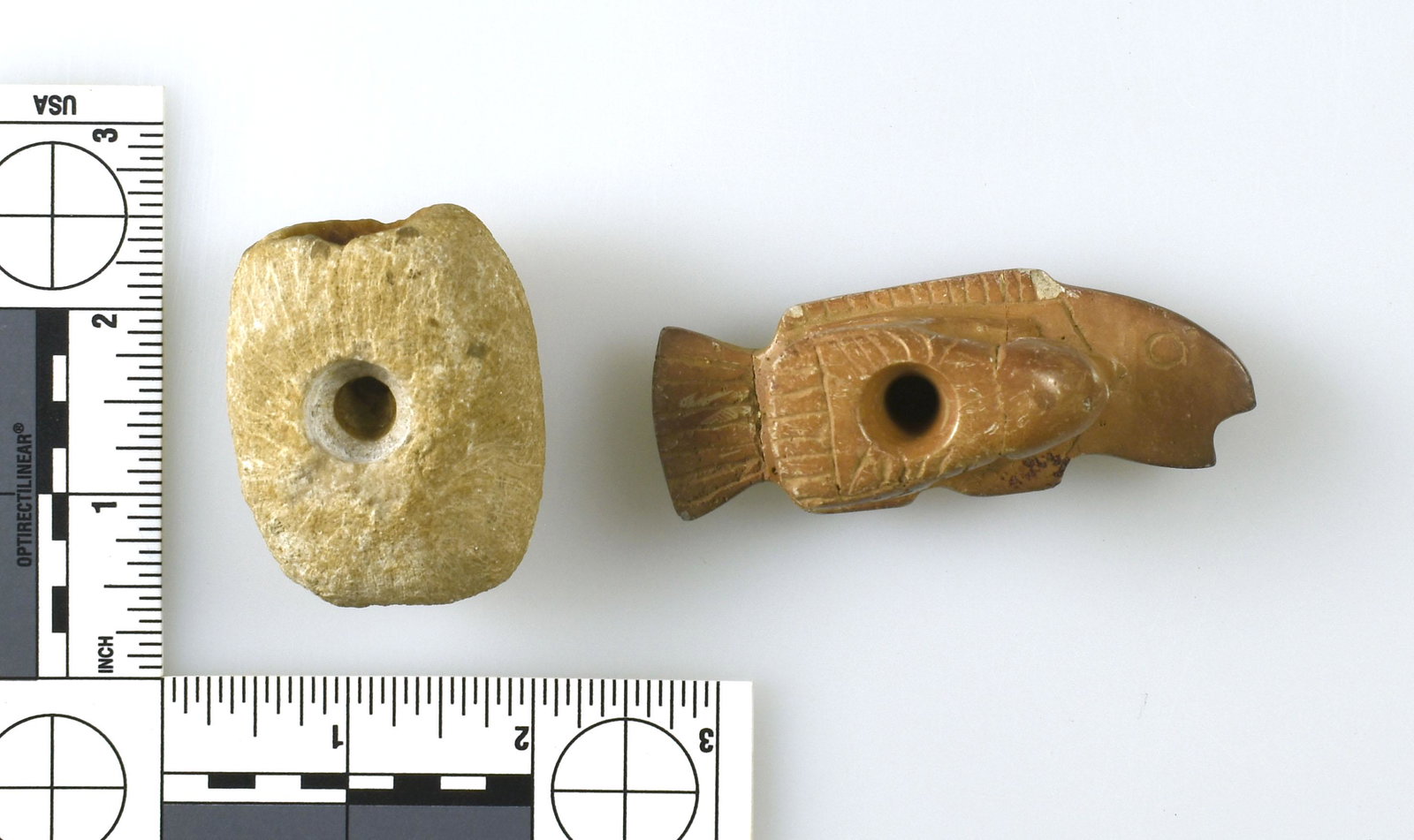 2 Decorative Indian Pipe Forms:  Offered as 'decorative'. Pipestone platform measures 3 1/4" long. Both from an old Kentucky Collection but we are selling these as 'decorative'. Very presentable in any case.