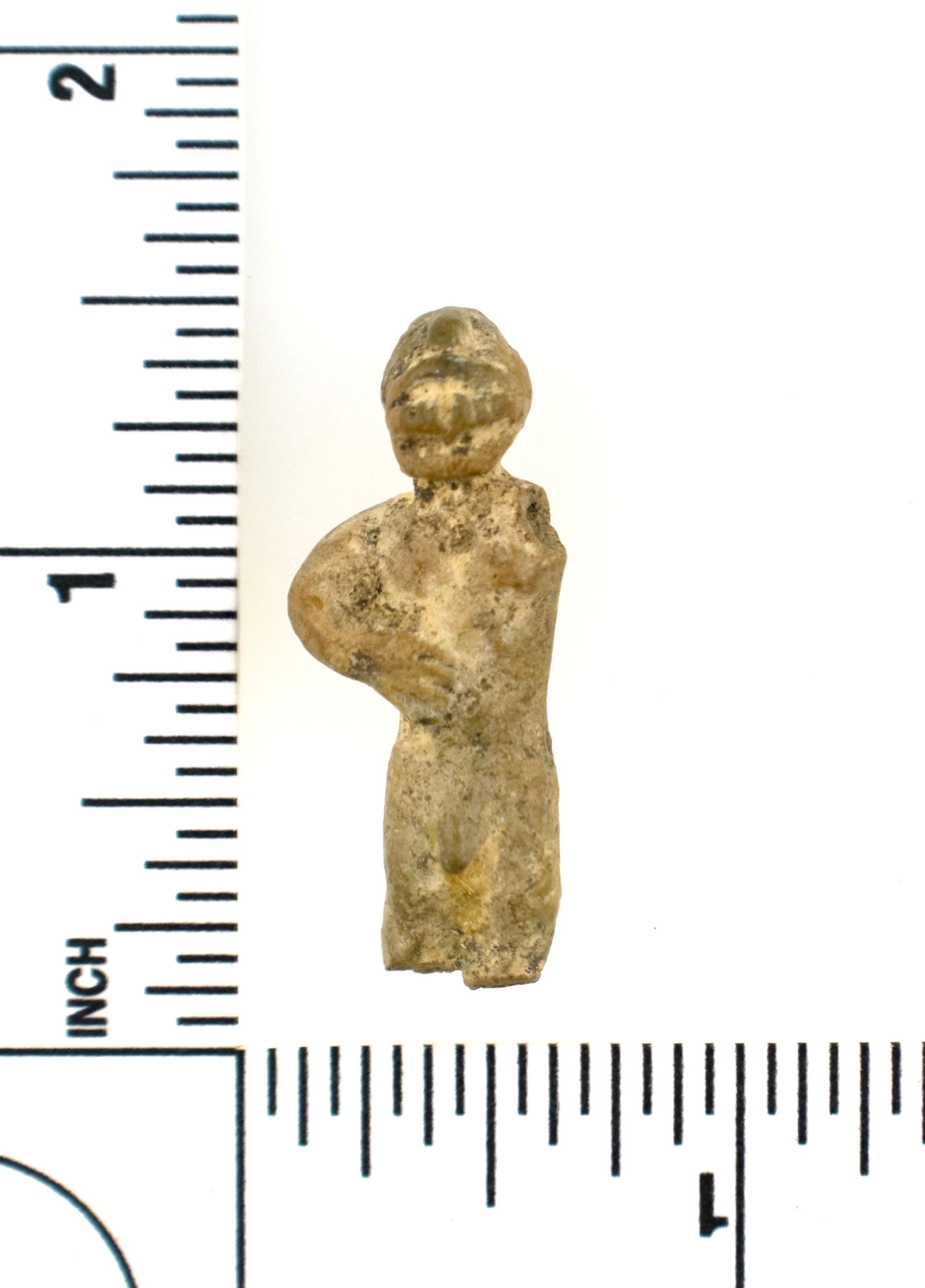 Miniature Pre-Columbian Male Figurine: Sculpted terracotta. Measures 1 3/8" long. Great detail. Full featured head and face, bun style hairdo, buttocks, and obviously anatomically correct male genitalia. Mexico. Ex- Finello Collection