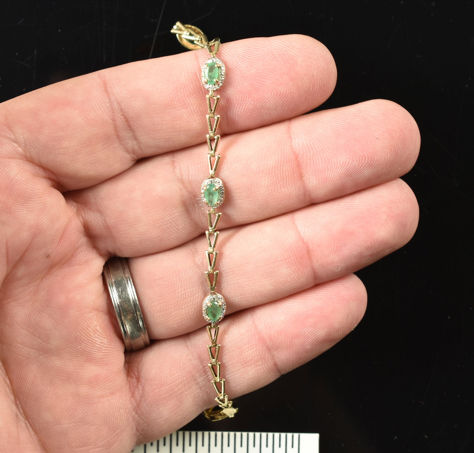 10k Gold Bracelet w/ Emeralds: Will need repair to chain, but otherwise a nice bracelet with 4 pale green emeralds. 3.3grams