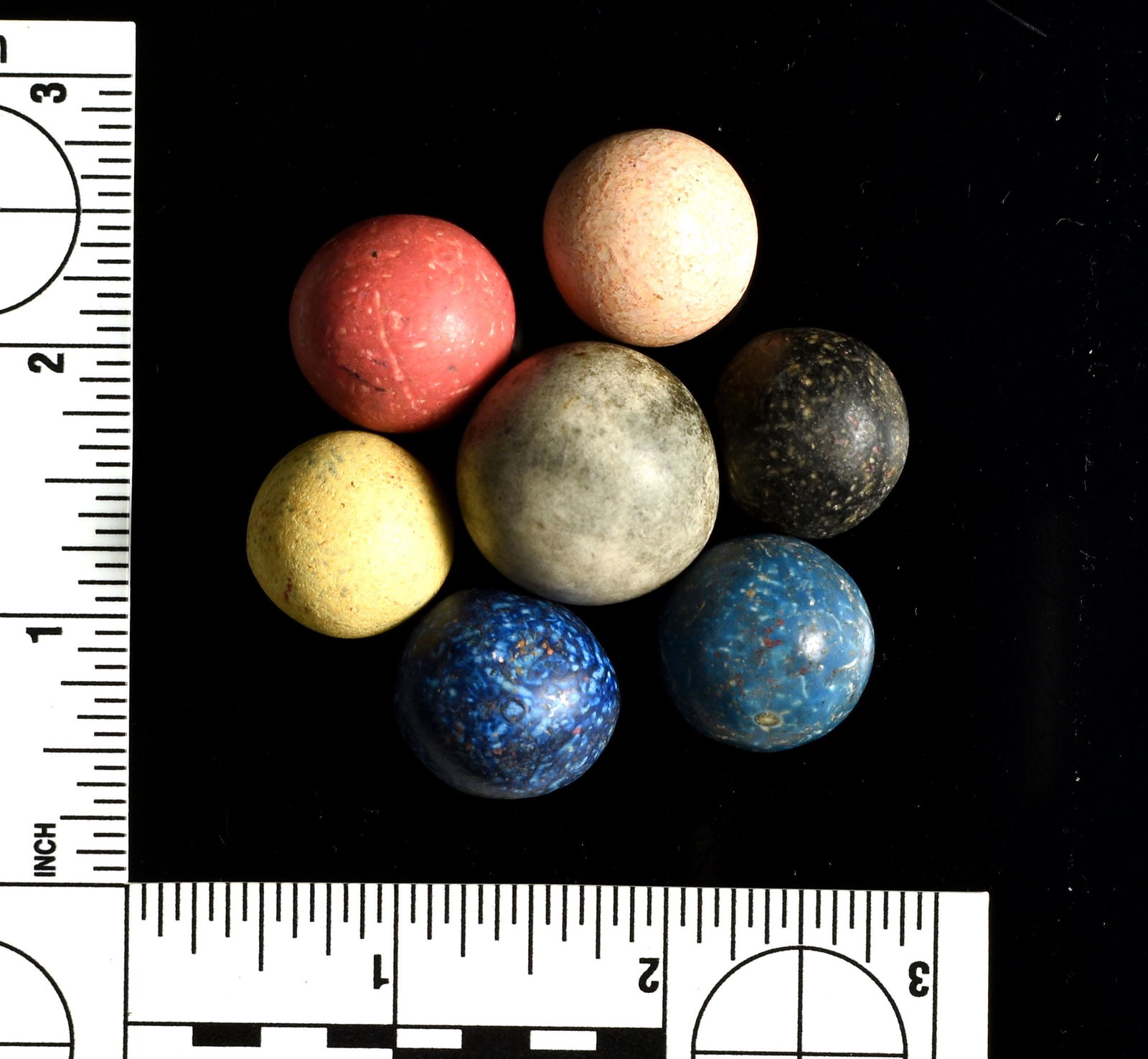 Mini-Collection of Antique Marbles: Exact ages unknown. Very old however as they were all discovered under the floor of a true early log cabin in Bath Co., Kentucky. The marbles are very heavy, have great colors, and the largest measure