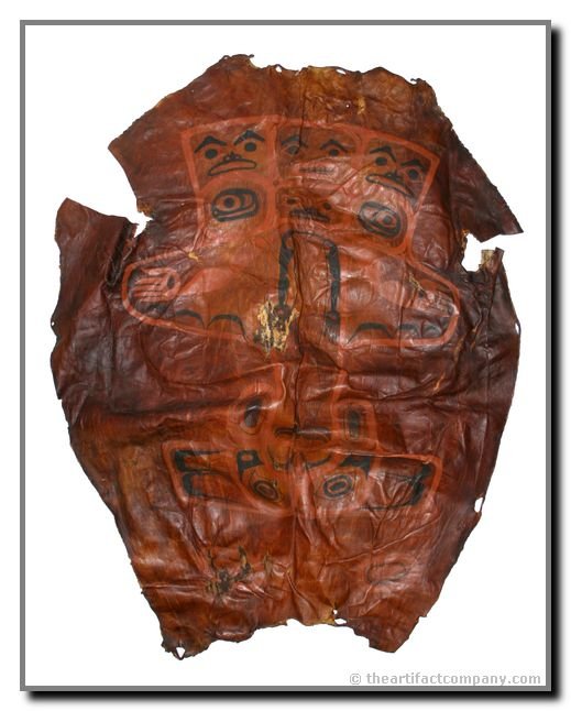 32" x 40" Tlingit/Haida Painted Sealskin Cape: Features a representation or Totem of the Seal Spirit with inset man of unknown vintage. Very rare item with no recent comparison. Provenance available.