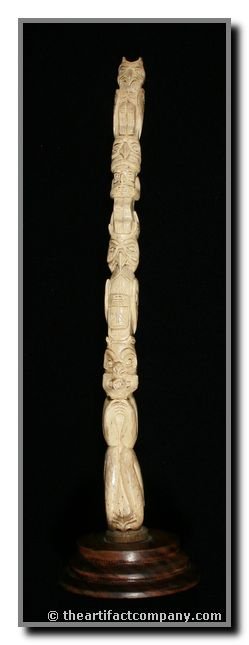 11" Northwest Coast Totem: Carved Seal Oosik (baculum) bone featuring 4 deities on a wooden base. Excellent vintage unsigned piece with great polish.