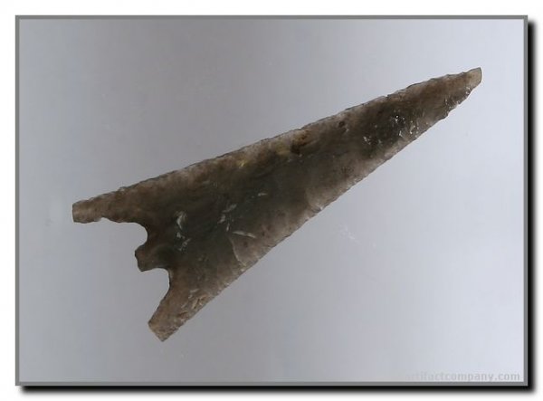 1 15/16" Bassett: Made from a highly translucent gray Novaculite, this is one of 24 Bassetts found by James Freeman in a cache in 1989 in Clark Co., Arkansas. Ex - Johnson, Cason Collections. Perino COA Ceremonially Br