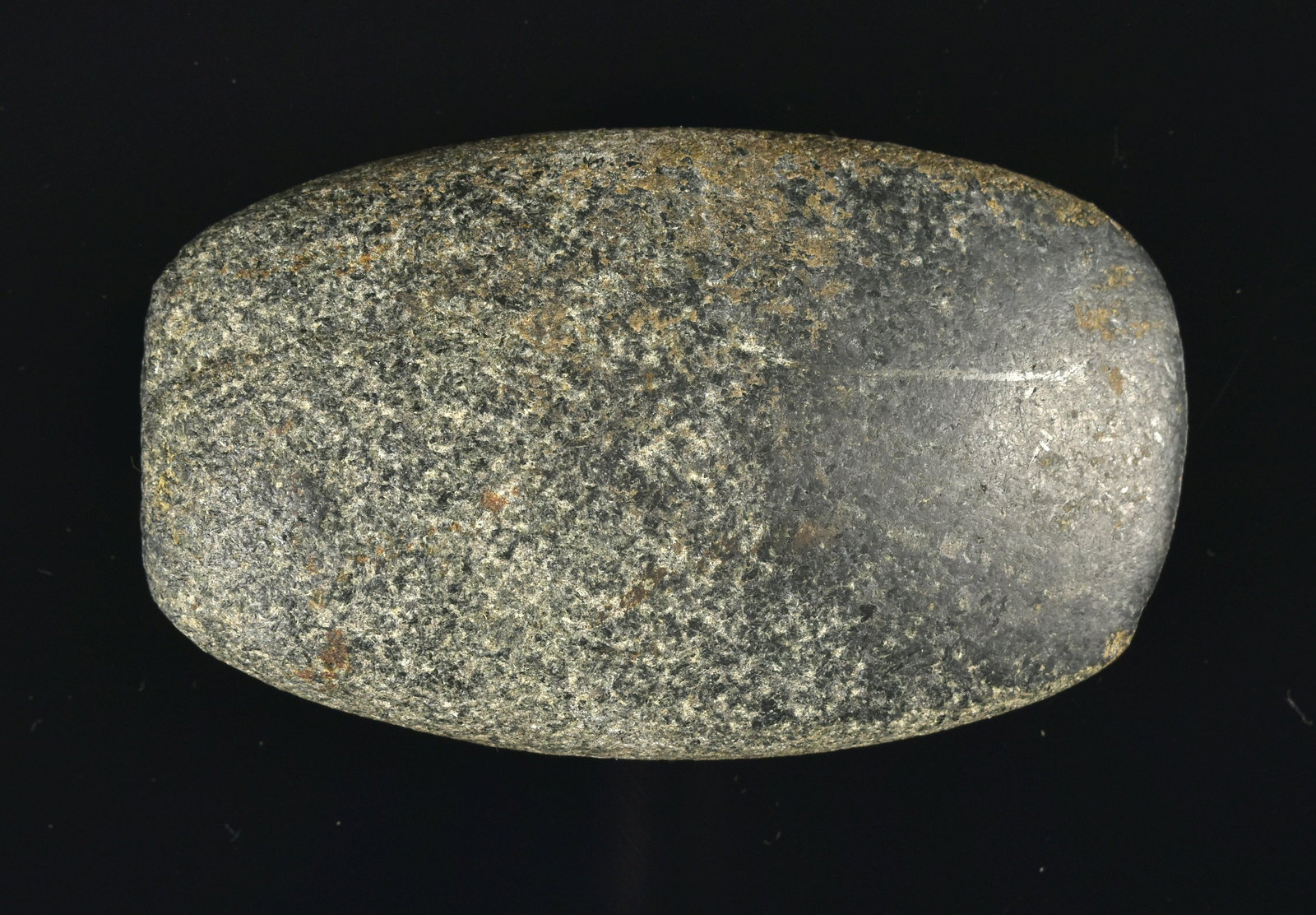 4 1/16" Black Granite Indiana Celt: Nicely made black granite example from Southern Indiana. Ex Lands Collection.