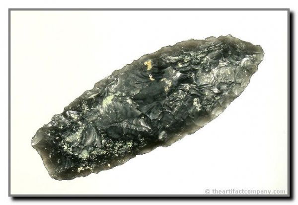 2 5/8" Agate Basin: Harney Co., Oregon. Obsidian. Lightly ground example in translucent obsidian with excellent mineralization. JACKSON COA