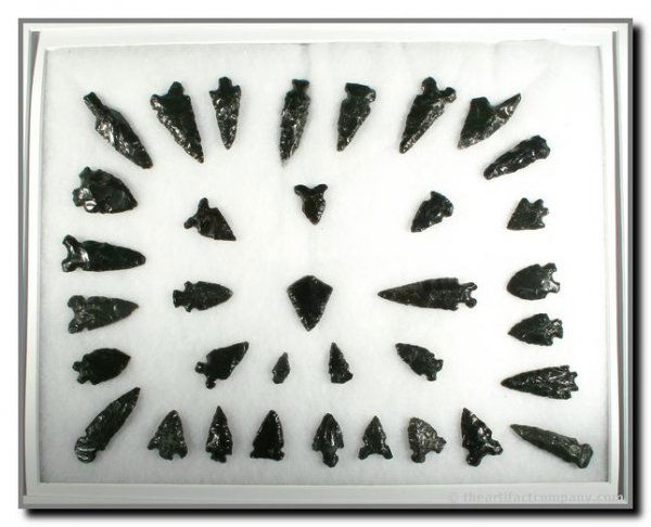 Obsidian Decorator Frame: Excellent arrangement of 35 Obsidian points from eastern Oregon. Superb decorator in a tasteful frame suitable for wall-hanging.