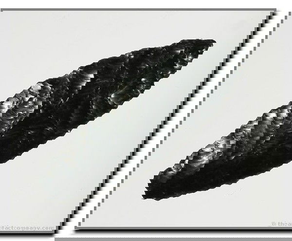 2" Cascade: Excellent and ultra thin obsidian example from Eastern Oregon with killer flaking.. Ex - Ernie Cowles, Virgil Russell collections.