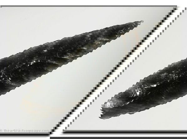 2 1/2" Cascade: Incredibly 'Wavy-Gravy' bands in this translucent smoky Obsidian. Klamath Co., Oregon. Ex - Bodle Collection.