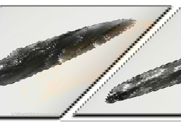 2 5/8" Lind Coulee: Stunning example of highly translucent obsidian with dark storm-clouds. Lake Co., Oregon. Ex - Akers Collection.