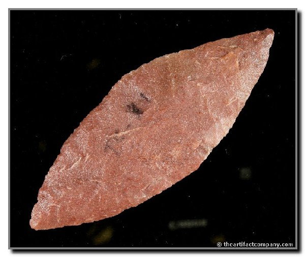 040: 4 1/16" Bipointed Knife: Translucent and well made piece in pink fine grained quartzite found by George Green on the Tin-Camp Ranch in Lincoln Co., Nebraska.
