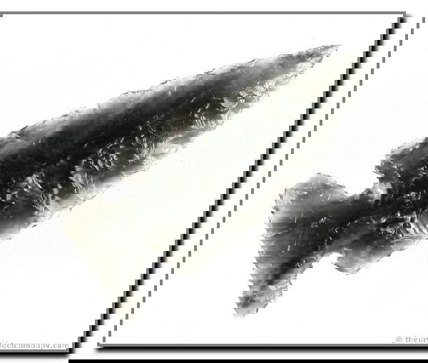 089: 2 1/8" Northern Side Notch: Mossy Translucent Obsidian. Found on the Briggs Ranch in Harney Co., Oregon.