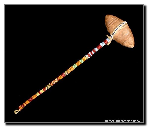 20" Grooved BiConical War Club: Excellent beaded handle on this Plains pieces. Ex - Robert Blake Collection. Jackson COA