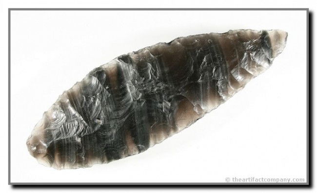 6 3/16" Bipointed Knife: Beautifully banded translucent obsidian example from Oregon. Ex - Bill Heap Collection.