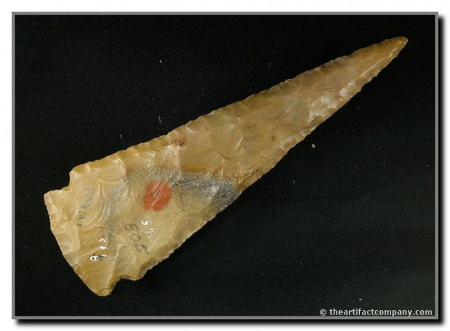 5 1/2" Cobbs Knife: Unusual stem edges on this example formerly of the Payne, Johnson, and Terry Allen Collections. Chicot Co., Arkansas, Like Chicot. Tan high-grade flint.